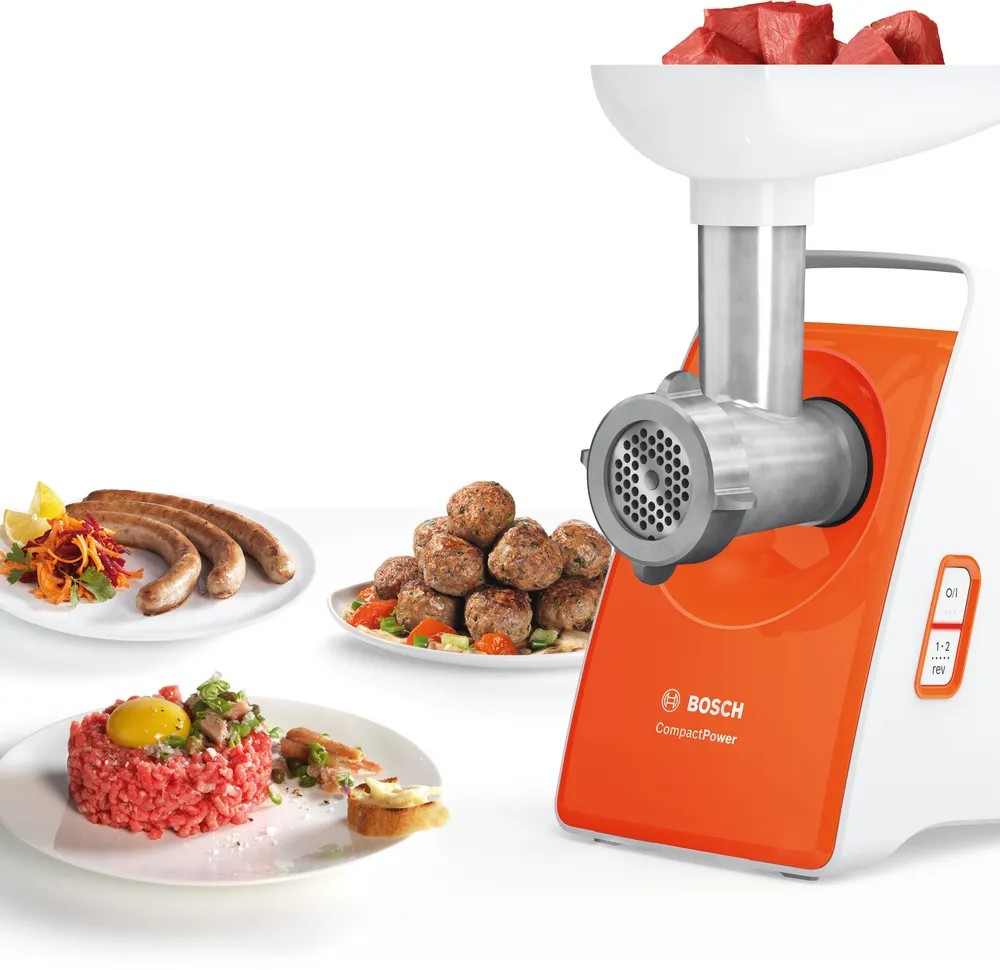 CompactPower Meat Mincer – 1600W Max Power, Citrus Press, Kebbe & Sausage Attachments, White with Soft Orange | Bosch MFW3630I